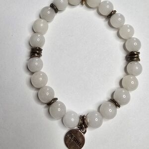 Elegant White Beaded Bracelet with Charm